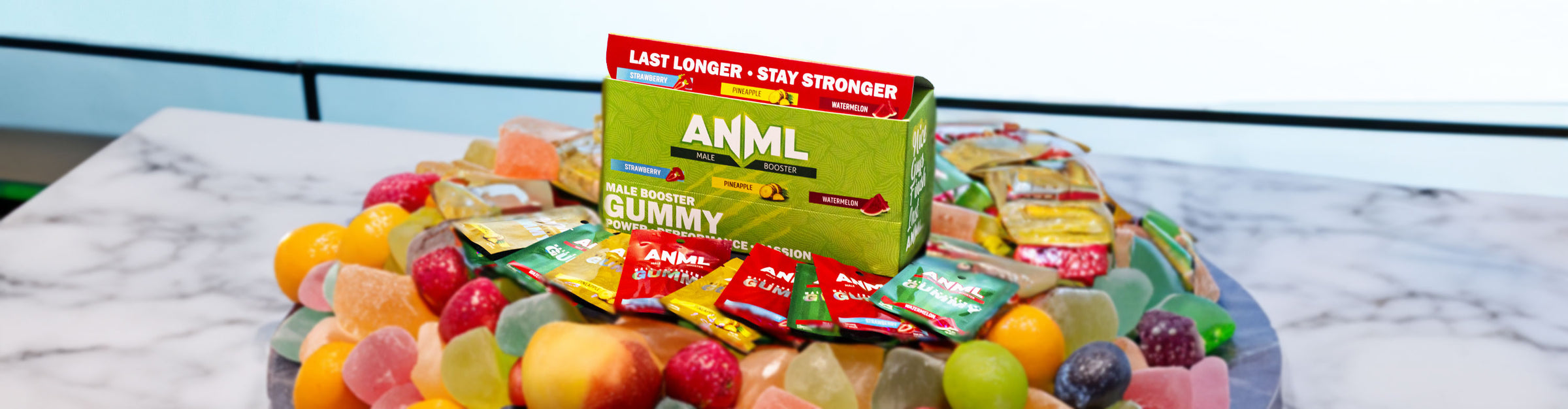 Got Vape Wholesale ANML Collection with fruits and candy atop a marble display