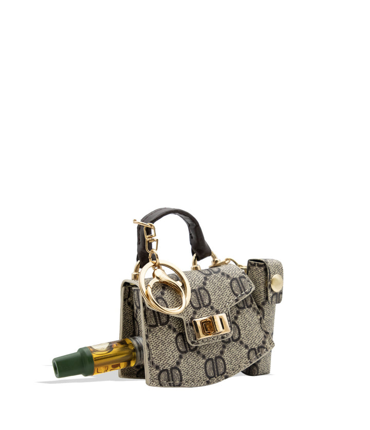 Smyle Pursejamin cartridge vaporizer in quarter view displaying cartridge on a white background