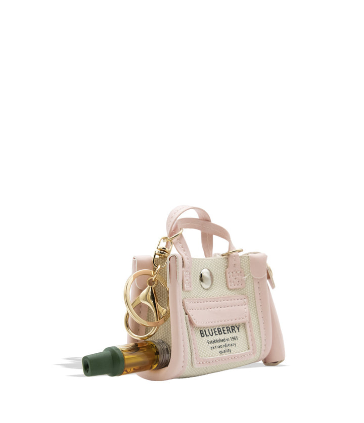 Smyle Pursejamin cartridge vaporizer in quarter view displaying cartridge on a white background